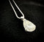 Pendentif Pendentif diamant taille poire 5 ct et diamant brillant 0,08 ct 58 Facettes