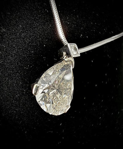 Pendentif Pendentif diamant taille poire 5 ct et diamant brillant 0,08 ct 58 Facettes