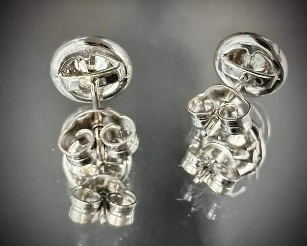 Boucles d'oreilles Boucles d’oreilles en or blanc 18 carats et diamants 58 Facettes