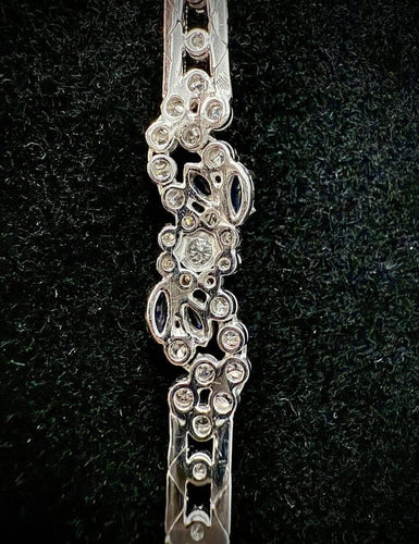 Bracelet Bracelet maille écaille en or blanc 18 carats, diamants et saphirs 58 Facettes