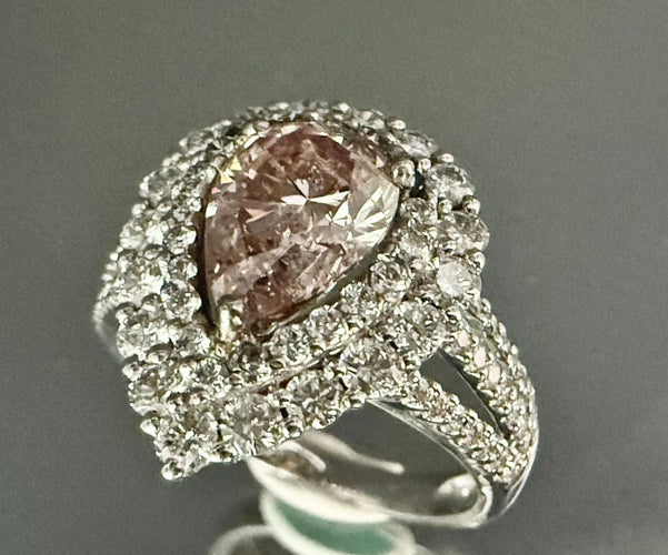 Bague 54 Bague en or blanc 18 carats sertie d’un diamant rose taille poire 58 Facettes