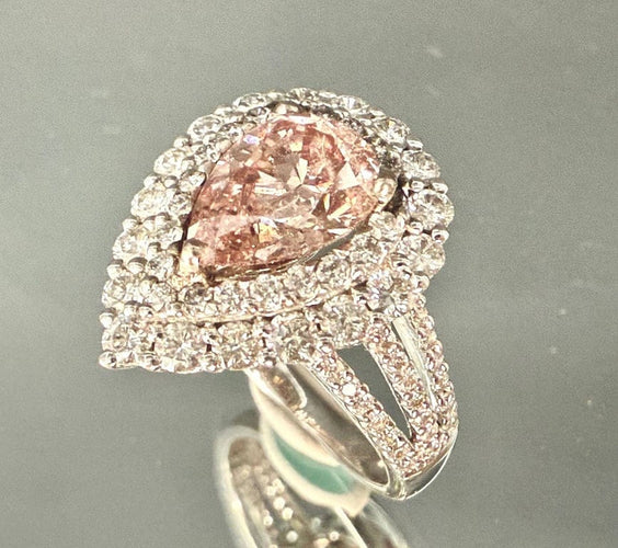Bague 54 Bague en or blanc 18 carats sertie d’un diamant rose taille poire 58 Facettes