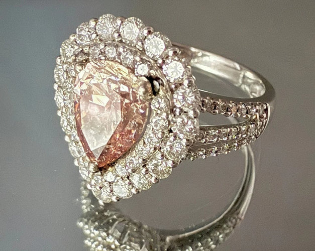 Bague 54 Bague en or blanc 18 carats sertie d’un diamant rose taille poire 58 Facettes