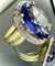 Bague 63 Bague en or jaune 18 carats avec tanzanite 16 ct et diamants 58 Facettes