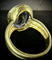 Bague 63 Bague en or jaune 18 carats avec tanzanite 16 ct et diamants 58 Facettes
