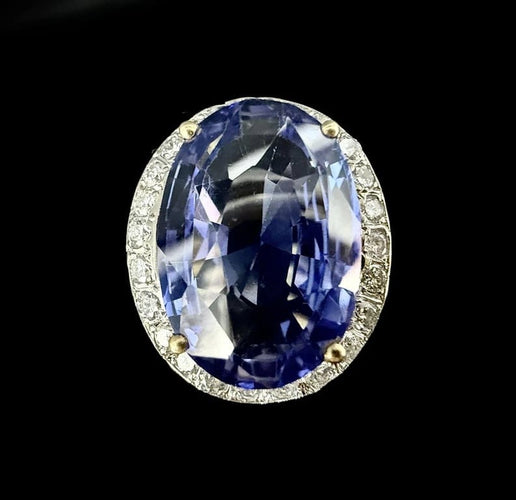 Bague 63 Bague en or jaune 18 carats avec tanzanite 16 ct et diamants 58 Facettes