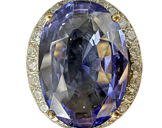 Bague 63 Bague en or jaune 18 carats avec tanzanite 16 ct et diamants 58 Facettes