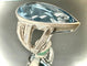 Bague 58 Bague en or blanc 18 carats sertie d’une topaze et diamants 58 Facettes