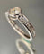 Bague 56.5 Bague en or blanc 18 carats avec diamant 1 ct et diamants baguette 58 Facettes