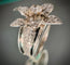 Bague 53.5 Bague fleur en or blanc 18 carats et diamants 58 Facettes
