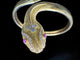 Bracelet Bracelet esclave serpent en or jaune 18 carats, diamants et rubis 58 Facettes