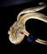 Bracelet Bracelet esclave serpent en or jaune 18 carats, diamants et rubis 58 Facettes
