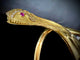Bracelet Bracelet esclave serpent en or jaune 18 carats, diamants et rubis 58 Facettes