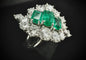 Bague 53 Bague en platine sertie d’émeraudes et de diamants 58 Facettes