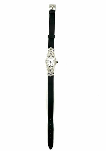 Montre Montre Art déco tonneau en platine, diamants et saphirs 58 Facettes