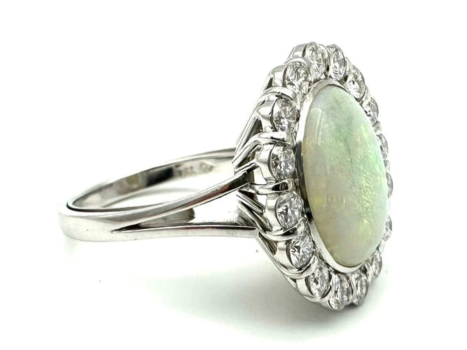 Bague Bague vintage en or blanc 18K avec opale et diamants 58 Facettes