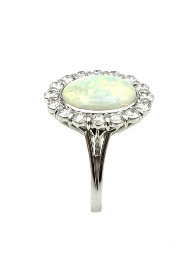 Bague Bague vintage en or blanc 18K avec opale et diamants 58 Facettes