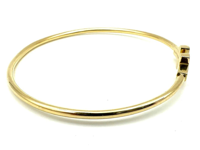 Bracelet Tiffany & Co. Tiffany T - Bracelet Wire en or jaune 18K 58 Facettes
