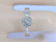 Bague 54 Bague entourage en or blanc 14 carats avec diamants 58 Facettes 2001
