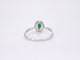 Bague 54 Bague entourage en or blanc 14 carats avec diamants et émeraude 58 Facettes 2012