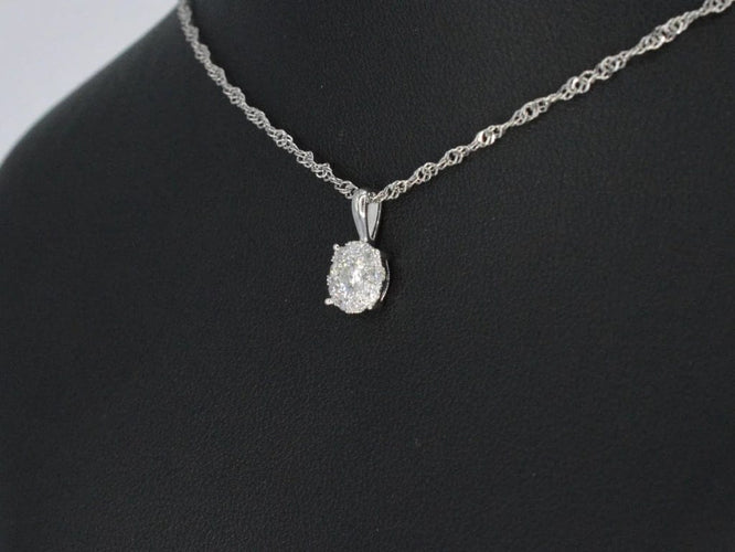 Pendentif Pendentif en or blanc 14 carats avec diamants 58 Facettes 2074