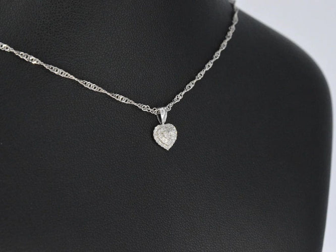 Pendentif Pendentif cœur en or blanc 14 carats avec diamants 58 Facettes 2078