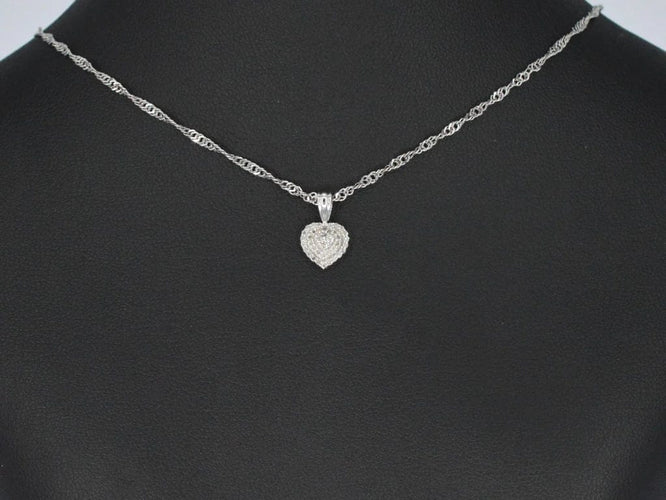Pendentif Pendentif cœur en or blanc 14 carats avec diamants 58 Facettes 2078