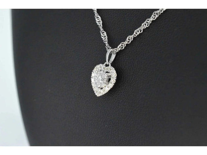 Pendentif Pendentif cœur en or blanc 14 carats avec diamants 58 Facettes 2082