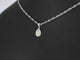 Pendentif Pendentif goutte en or blanc 14 carats avec diamant 58 Facettes 2077