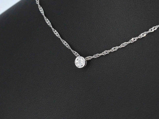 Pendentif Pendentif en or blanc 14 carats avec diamant taille brillant 58 Facettes 2089