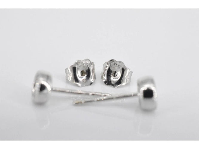 Boucles d'oreilles Boucles d’oreilles en or blanc 14 carats avec diamant taille brillant 58 Facettes 2090