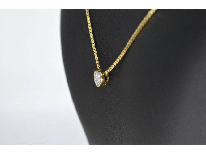 Pendentif Pendentif en or 14 carats avec diamant taille brillant cœur 58 Facettes 2098