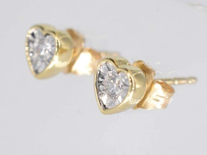 Boucles d'oreilles Boucles d'oreilles en or 14 carats avec diamant taille brillant cœur 58 Facettes 2099
