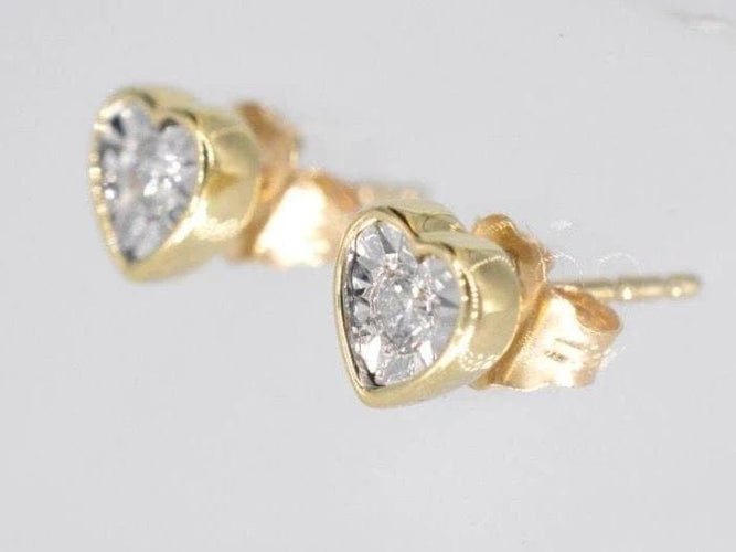 Boucles d'oreilles Boucles d'oreilles en or 14 carats avec diamant taille brillant cœur 58 Facettes 2099