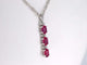 Pendentif Pendentif en or blanc 14 carats avec diamants et rubis 58 Facettes 2138