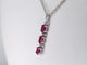 Pendentif Pendentif en or blanc 14 carats avec diamants et rubis 58 Facettes 2138