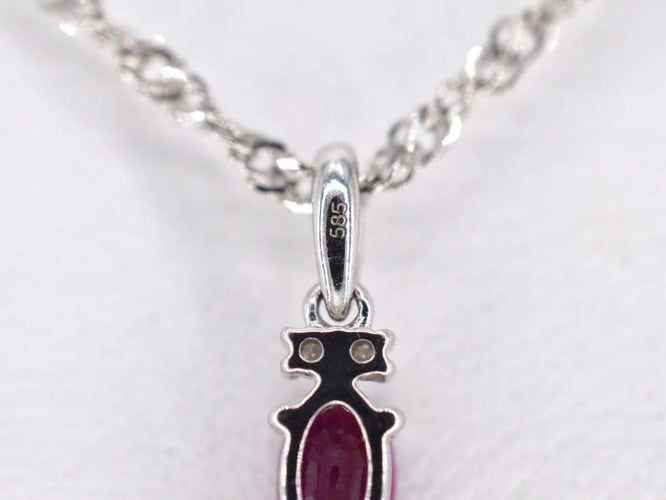 Pendentif Pendentif en or blanc 14 carats avec diamants et rubis 58 Facettes 2138