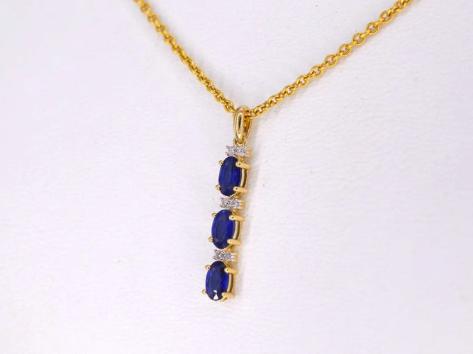 Pendentif Pendentif en or 14 carats avec diamants et saphir 58 Facettes 2137