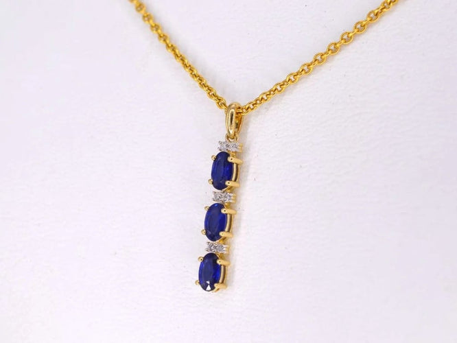 Pendentif Pendentif en or 14 carats avec diamants et saphir 58 Facettes 2137