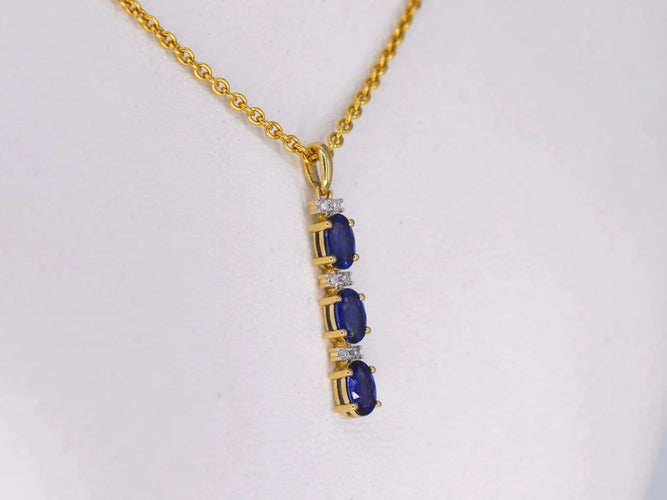 Pendentif Pendentif en or 14 carats avec diamants et saphir 58 Facettes 2137