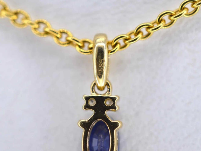 Pendentif Pendentif en or 14 carats avec diamants et saphir 58 Facettes 2137