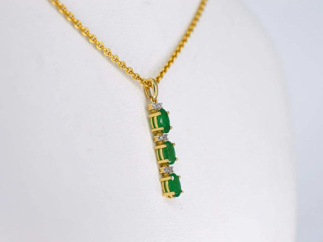 Pendentif Pendentif en or 14 carats avec diamants et émeraude 58 Facettes 2141
