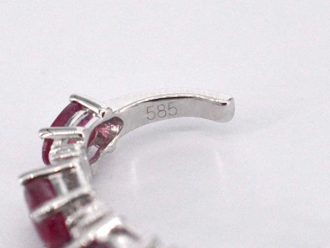 Boucles d'oreilles Boucles d'oreilles en or blanc 14 carats avec diamants et rubis 58 Facettes 2132