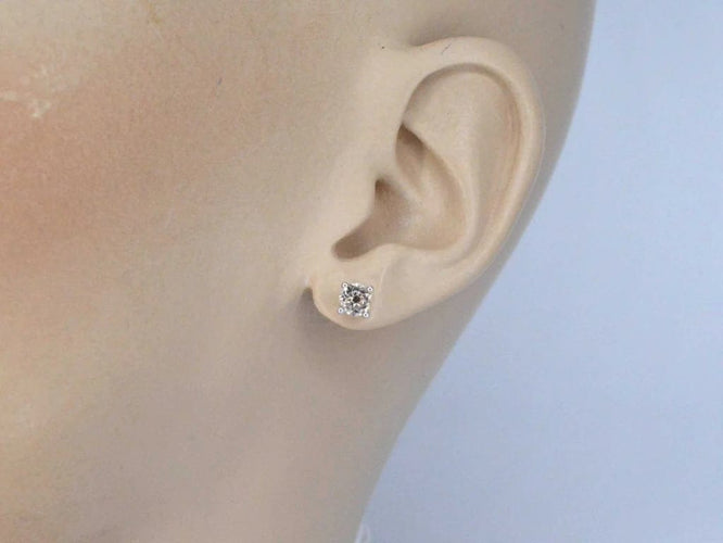 Boucles d'oreilles Boucles d’oreilles en or blanc 14 carats avec morganite 58 Facettes 2195