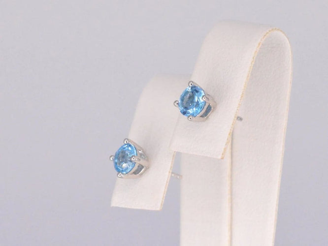 Boucles d'oreilles Boucles d’oreilles en or blanc 14 carats avec topaze et diamant 58 Facettes 2201