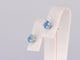 Boucles d'oreilles Boucles d’oreilles en or blanc 14 carats avec topaze et diamant 58 Facettes 2201