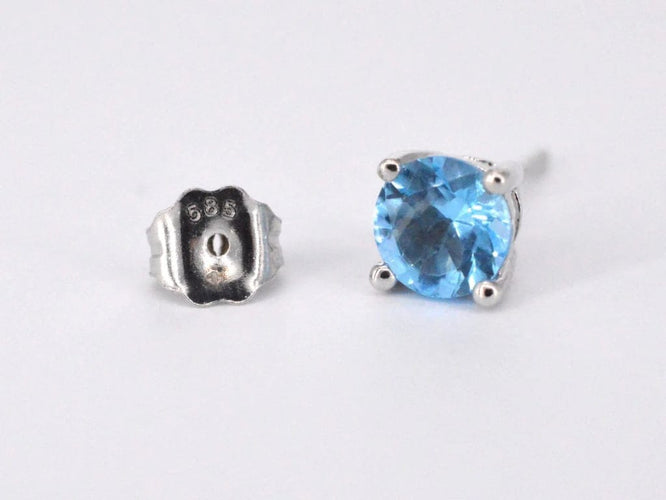 Boucles d'oreilles Boucles d’oreilles en or blanc 14 carats avec topaze et diamant 58 Facettes 2201