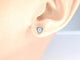 Boucles d'oreilles Boucles d’oreilles en or blanc 14 carats avec diamant cœur taille brillant 58 Facettes 2096