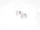 Boucles d'oreilles Boucles d’oreilles en or blanc 14 carats avec diamant cœur taille brillant 58 Facettes 2096