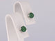 Boucles d'oreilles Boucles d'oreilles en or blanc 14 carats avec émeraude 58 Facettes 2204